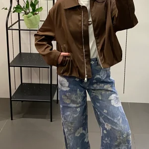 Jeans palazzo con fiori